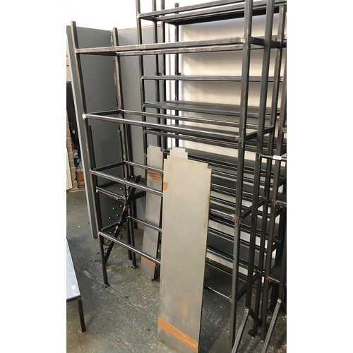 844 - A set of industrial style fabricated steel shelves, formed in two stacking sections, comprising four... 