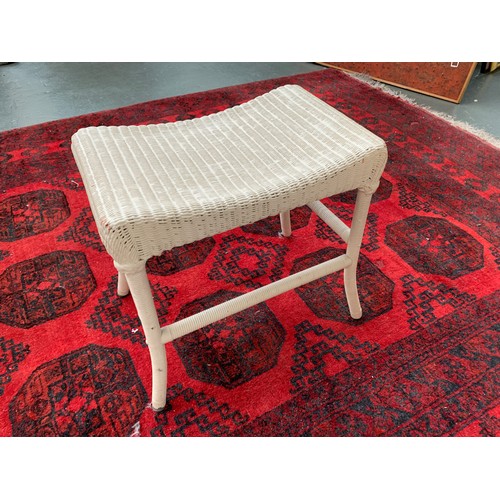 866 - A white painted Lloyd Loom wicker stool, bears label, 50cmW