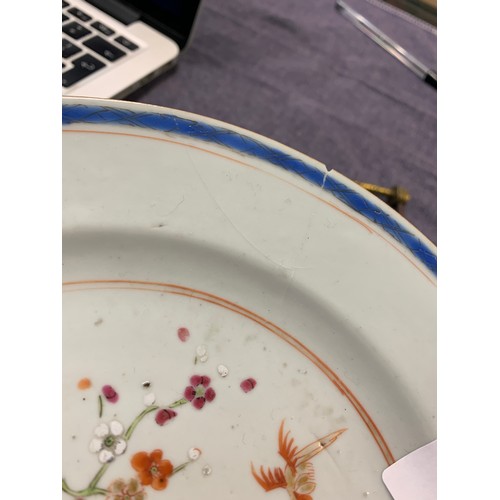 72 - Three Chinese porcelain plates with polychrome decoration depicting birds in a garden, 23cmD