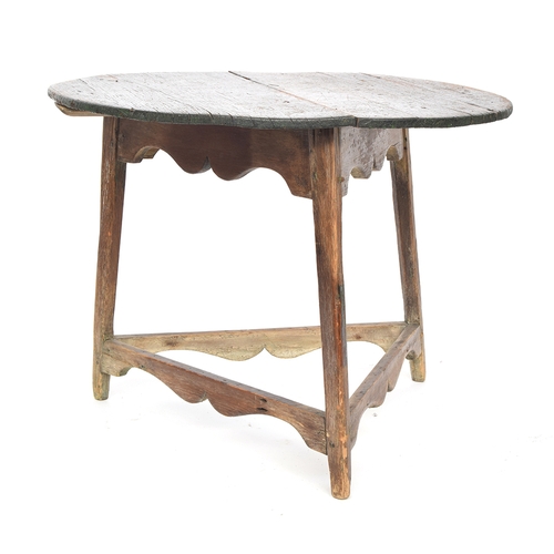 469 - A 19th century pine cricket table, circular two plank top with traces of original painted finish, on... 