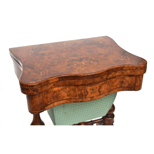 537 - A 19th century burr walnut and marquetry games and work table, the shaped foldover top opening to re... 