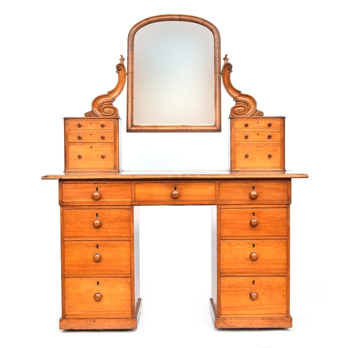 572 - A Victorian satin birch dressing table, adjustable mirror supported on two piers, each of three draw... 