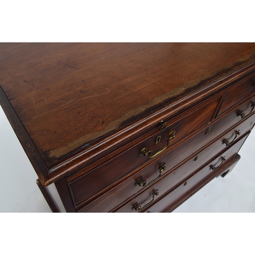 481 - A George III and later mahogany bachelor's chest, the moulded top over slide, two short and three gr... 