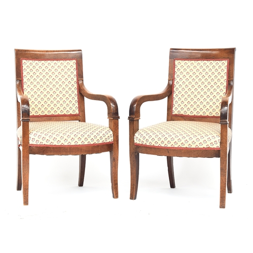 619 - A pair of Continental open armchairs, with upholstered seats and backs