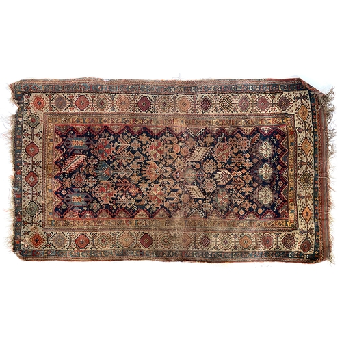 657 - A Persian Qashqai rug with triple border and geometric comb pattern, 226x134cm