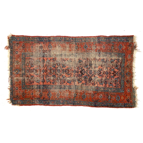 661 - A small Belouch red ground rug, 93x170cm