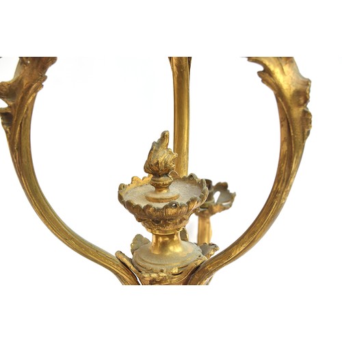 376 - A French gilt brass three arm ceiling light of scrolling foliate form, 74cm high