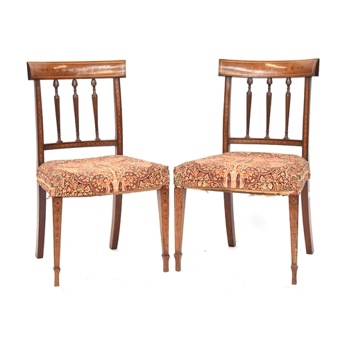 592 - A set of eight 19th century mahogany dining chairs, curved rail with bell flower marquetry, stuffove... 