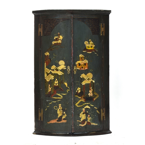 500 - A George III green Japanned bowfront corner cupboard, the doors depicting figures and pagodas, 60cm ... 