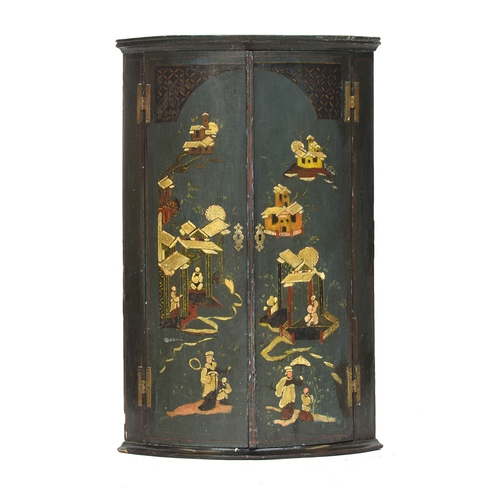 500 - A George III green Japanned bowfront corner cupboard, the doors depicting figures and pagodas, 60cm ... 