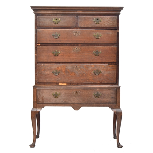 495 - A George II oak chest on stand, moulded cornice, two short over three long drawers, base with furthe... 