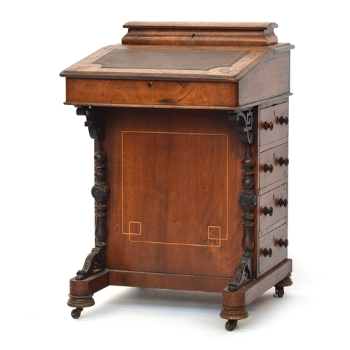 583 - A Victorian walnut davenport desk, with moulded superstructure and hinged writing slope, four side d... 