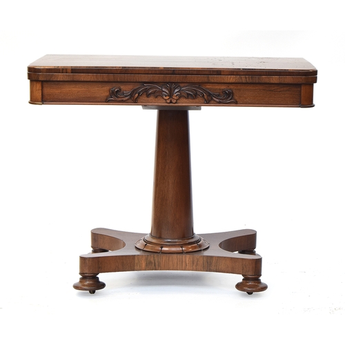 527 - A 19th century rosewood card table, foldover top with circular green baize inset, on tapered column,... 