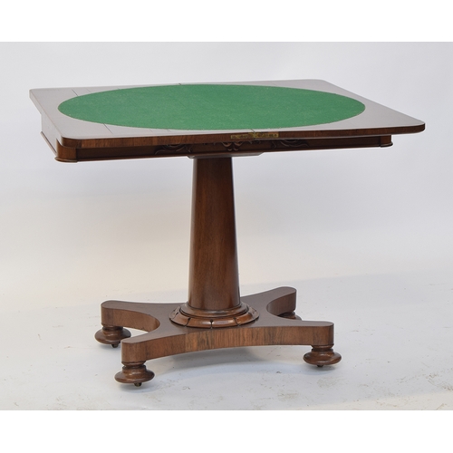 527 - A 19th century rosewood card table, foldover top with circular green baize inset, on tapered column,... 