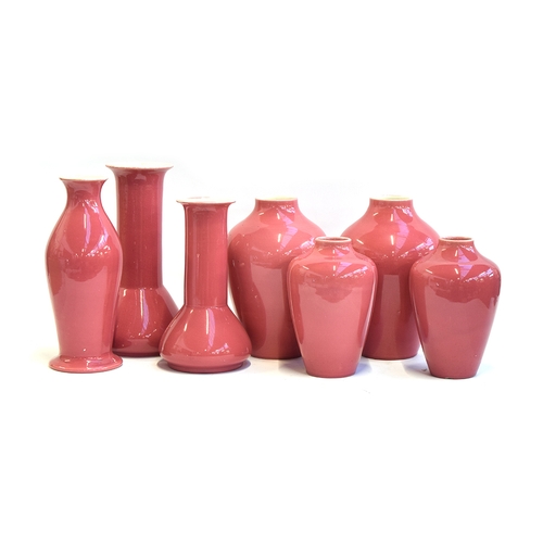 203 - Seven various Ault pottery pink glazed vases, 21.5cm to 32cm high