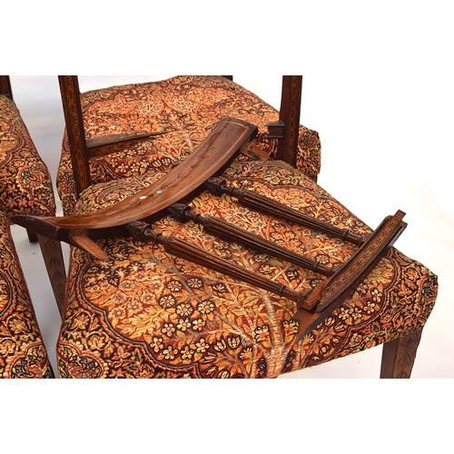 592 - A set of eight 19th century mahogany dining chairs, curved rail with bell flower marquetry, stuffove... 