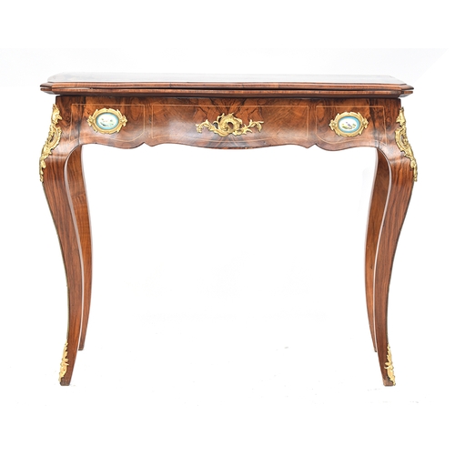 530 - A walnut and marquetry card table, the shaped foldover top with floral marquetry border, the frieze ... 