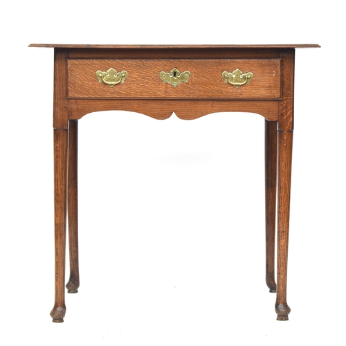 554 - A George II oak lowboy, three plank moulded top over single drawer, on tapering legs and pad feet, 7... 