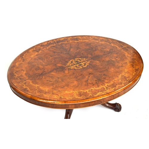 639 - A Victorian burr walnut and marquetry oval table, cut down for use as a coffee table, 141cm wide, 10... 