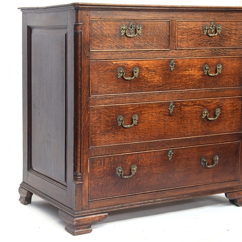 484 - A George III oak chest of drawers, the moulded top over two short and three graduating cockbeaded dr... 