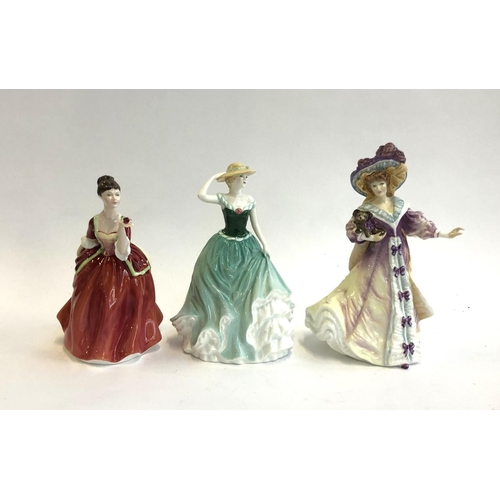 69 - Three Royal Doulton figurines: HN3970 'Flower of Love', HN4093 'Emily', HN3626 'Lily', the tallest 2... 