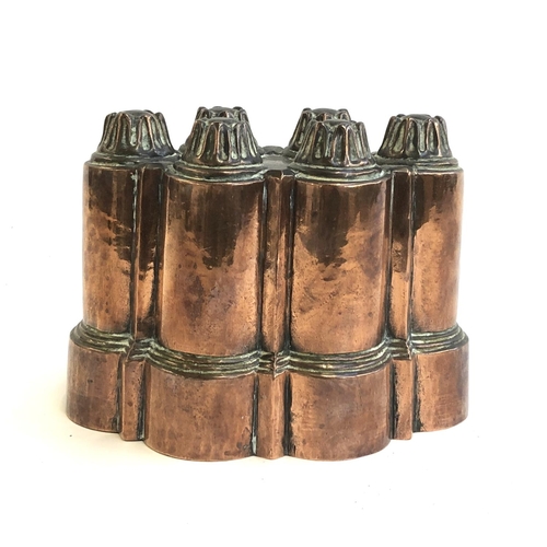 172 - A Victorian copper jelly mould, 18cmL