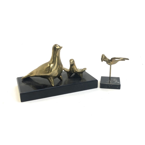 178 - A Greek brass figure group of two doves, together with one other (2)