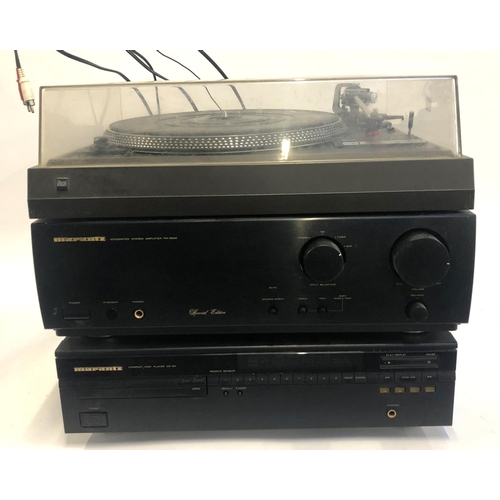 183 - A Dual 505 belt drive turntable missing its feet, together with a Marantz integrated stereo amplifie... 