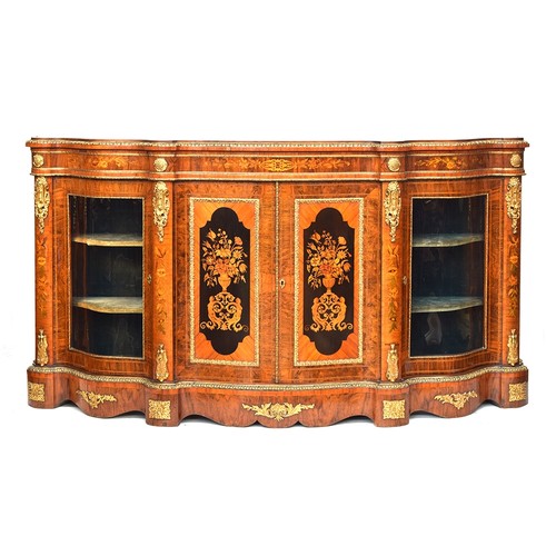 640 - A large Victorian gilt metal mounted walnut, kingwood and marquetry serpentine credenza, the moulded... 