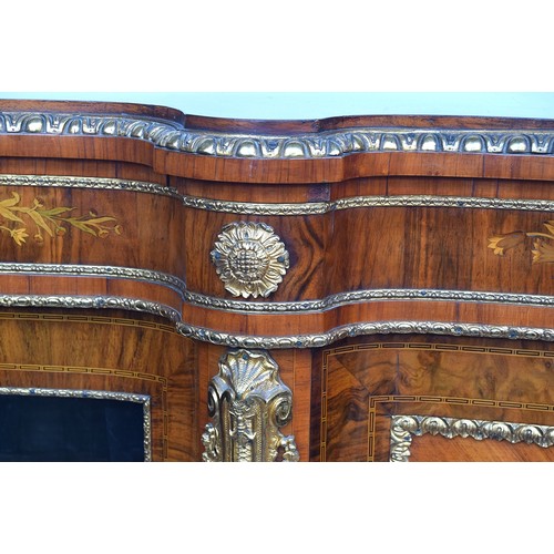 640 - A large Victorian gilt metal mounted walnut, kingwood and marquetry serpentine credenza, the moulded... 