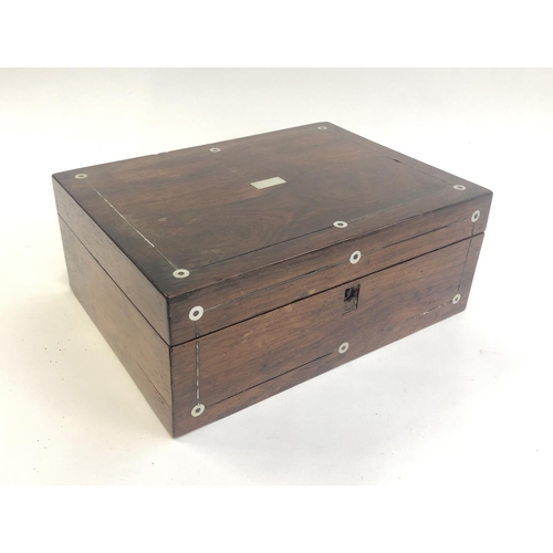 164 - A rosewood sewing box with mother of pearl inlay, 30x22.5x12cm