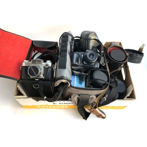 213 - A mixed lot of photographic equipment to include a Miranda Sensorex with f2.8 35mm lens, a Pentax a3... 