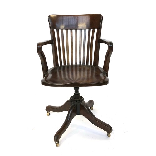 706 - An early 20th century swivel office chair, by Finsbury Furnishings Co