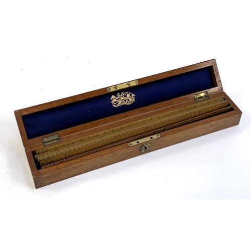 240 - A Stanley's Engine Divided Scale, six rules within a fitted oak case, 24cmL