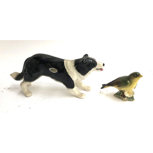 129 - A Beswick Greenfinch 2105, together with a Sylvac border collie