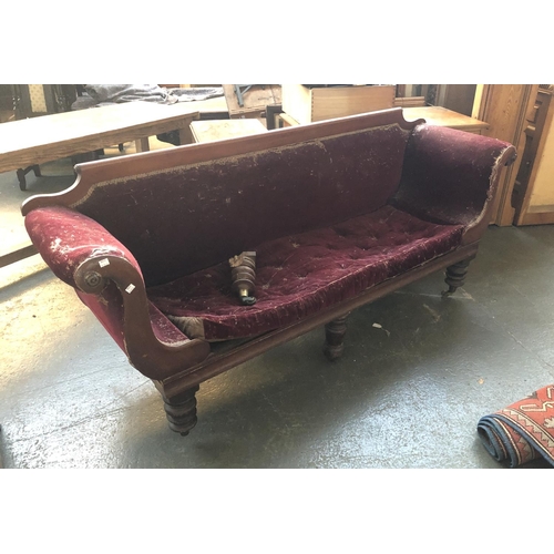 566 - A Victorian sofa with scrolling carved mahogany frame, one leg af, 205cmW