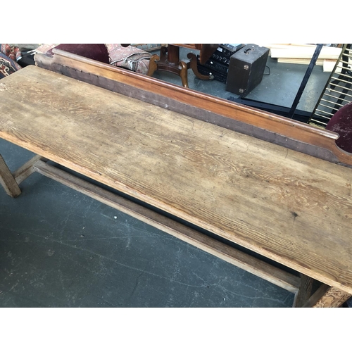 576 - A narrow pine kitchen table, on solid legs and H stretcher, 214x60x74cmH