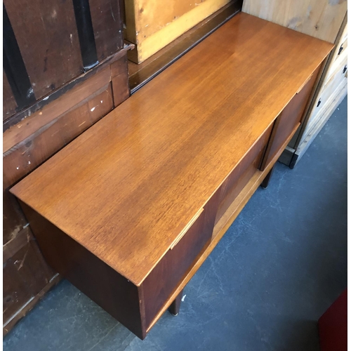 620 - A mid century teak sideboard, three drawers flanked by sliding cupboards, 128x44x74cmH