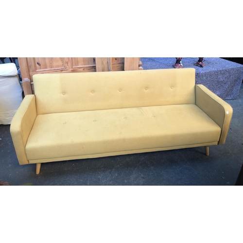 658 - A Made.com sofa bed, in mustard yellow, 205cmW