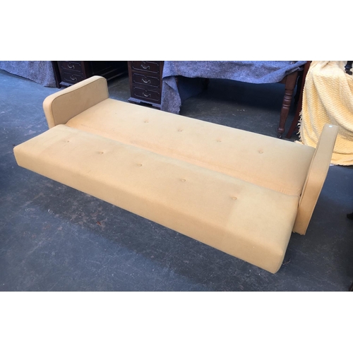 658 - A Made.com sofa bed, in mustard yellow, 205cmW