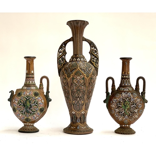 136 - Three c.1900 German stoneware vases, with polychrome decoration, the tallest twin handled vase 44cmH... 