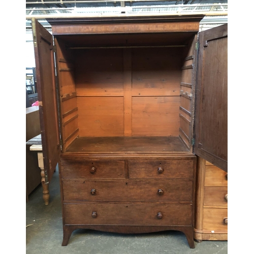 670 - A Regency mahogany linen press, the top converted to a hanging rail, with two cupboard doors, the ba... 