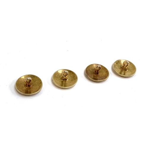 15 - A set of four heavy yellow metal buttons, gross weight approx. 11.3g