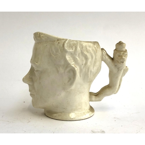 143 - An unusual commemorative mug in the form of the head of King Edward VIII, 12.5cmH