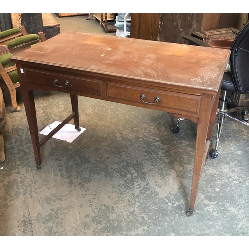 666 - A mahogany side table, two frieze drawers on square tapered legs with ceramic casters, 106x55x78cmH