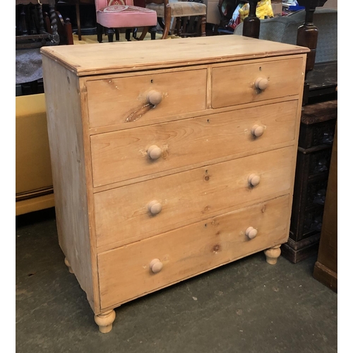 680 - A pine chest of drawers, two short over three graduating drawers, on turned wooden feet, 99x52x106