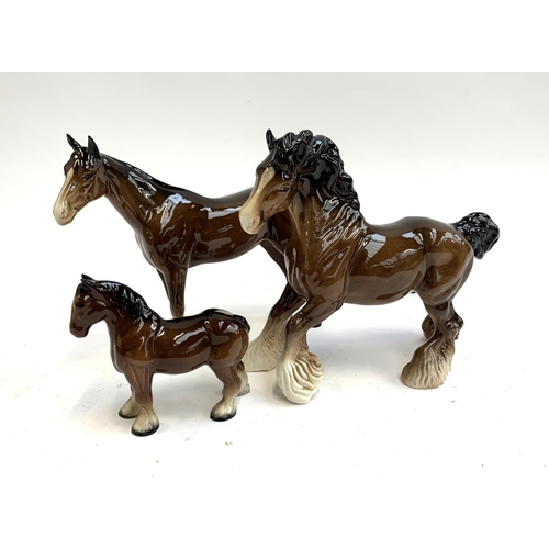 85 - A Beswick shire horse, 20cmH together with one other Beswick (both af); and a further ceramic horse