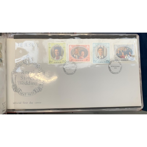 303 - A large quantity of first day covers in albums