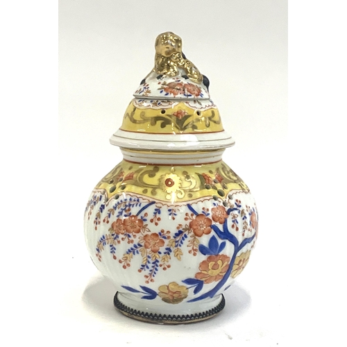 66 - An Aerozon Germany porcelain censer, with screw-action lid surmounted by a foo dog heightened in gil... 