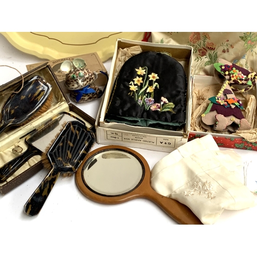 247 - A mixed lot of vintage kitsch items to include crinoline lady table runner; metal tray; hand mirrors... 